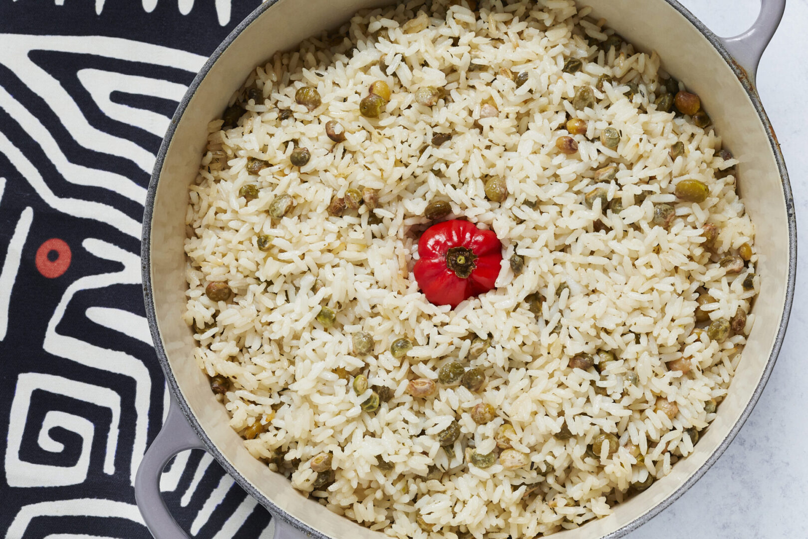 White rice tossed with green peas and chilli