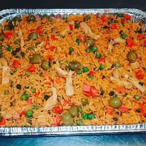 A spicy chicken, vegetables and oilves fried rice