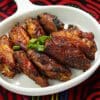 Crispy and spicy chicken wings served in a plate