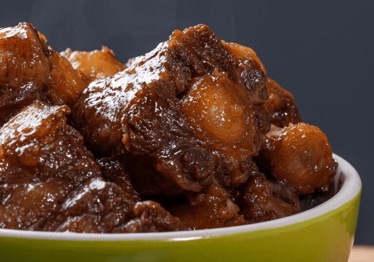 Close-up of a succulent beef stew with potatoes.